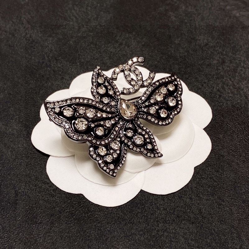 Ch*el brooches